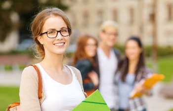 young student smiling to the camera