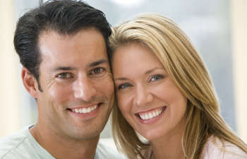 young couple smiling to the camera