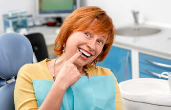 woman showing her beautiful teeth