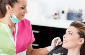 dentist talking with a patient