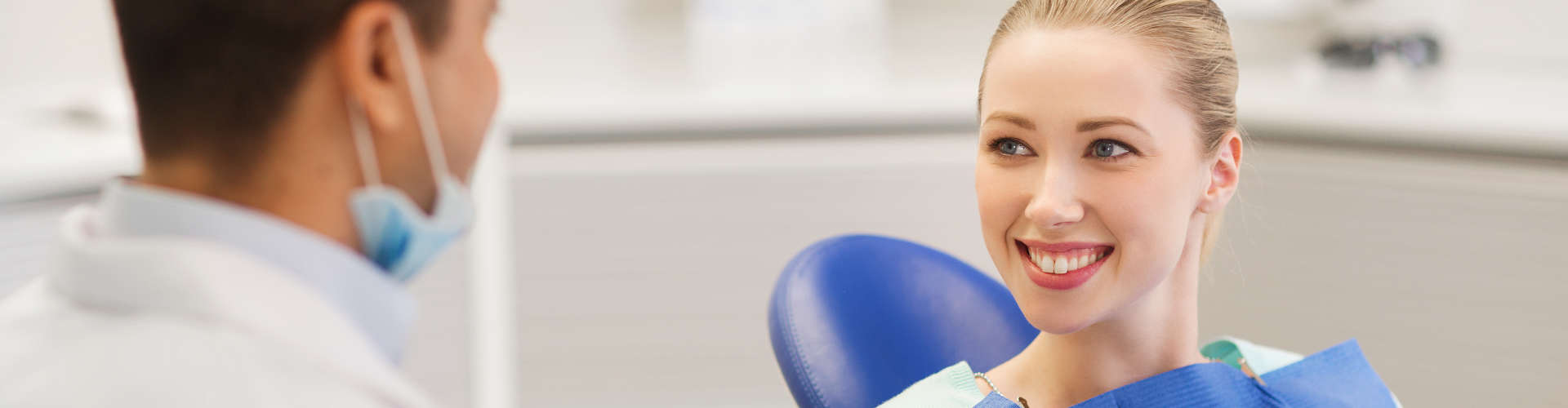 patient smiling to the dentist